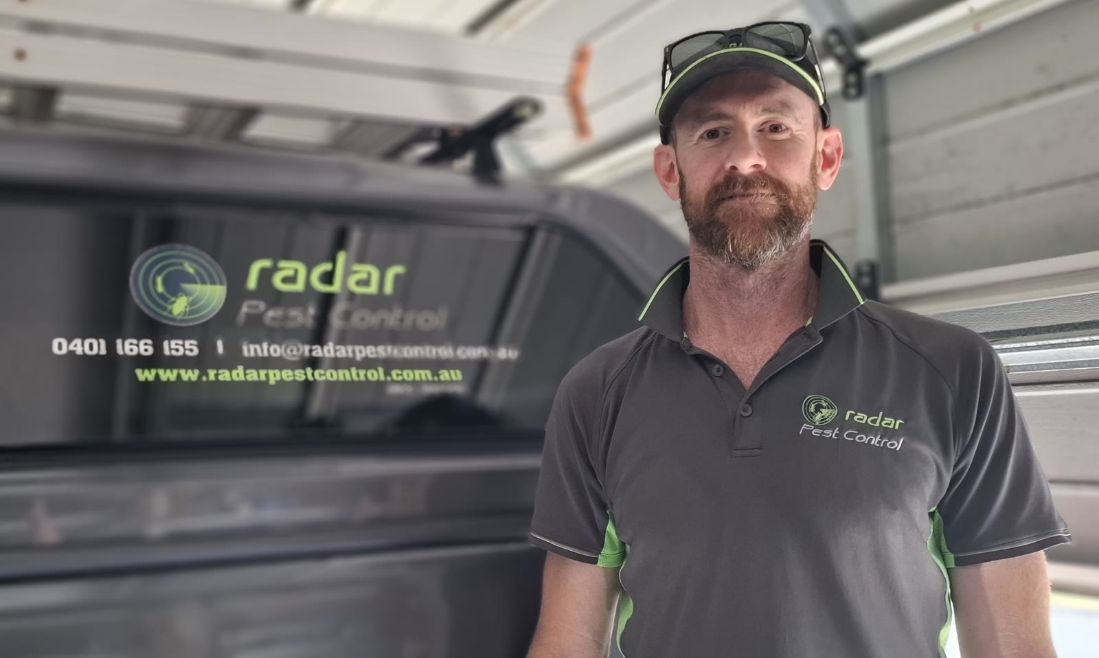 Mick, owner of Radar Pest Control, with the branded ute